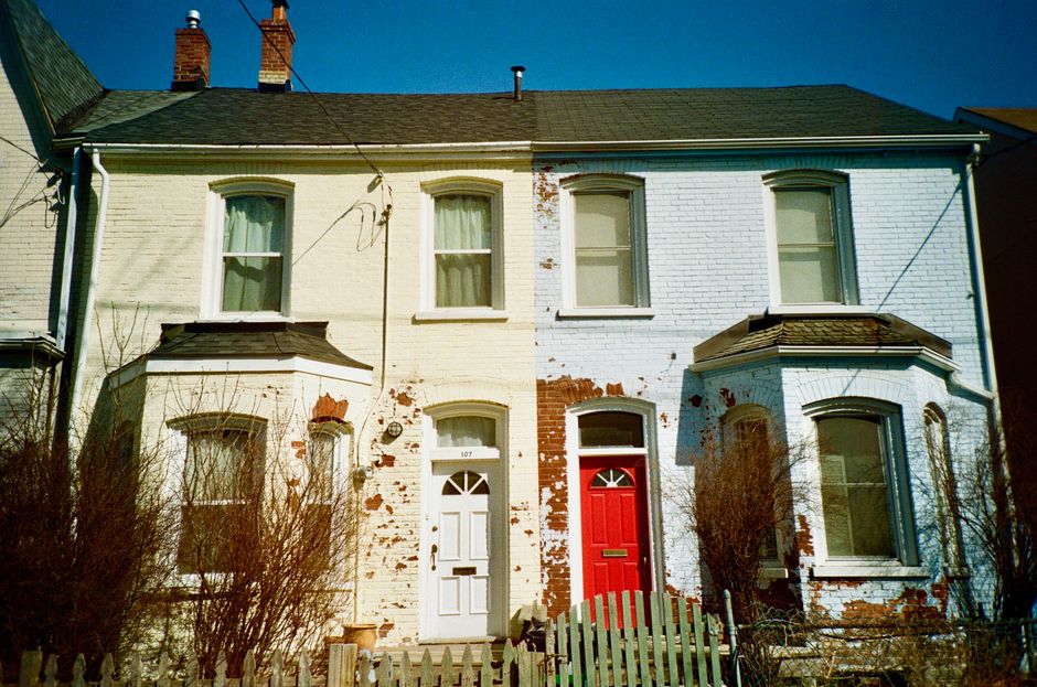 Close view of a painted house wall and window frame
