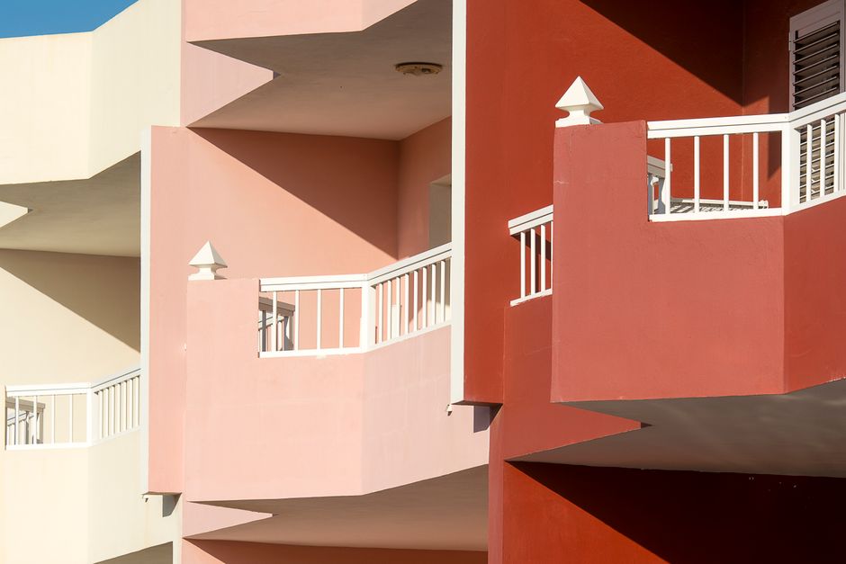 Close view of a painted house wall and window frame